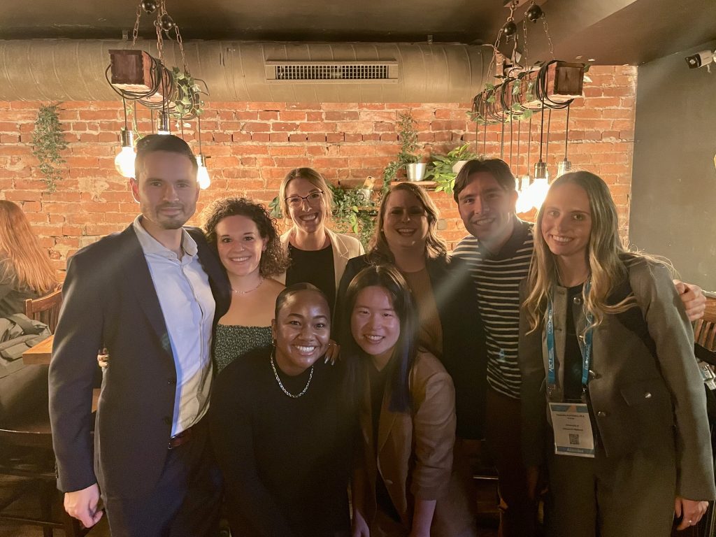 Members of the ASSIST Lab (Michael, Brooke, Kerri-Anne, Irene, Anne, Veronika, Connor, and stand in a group smiling.